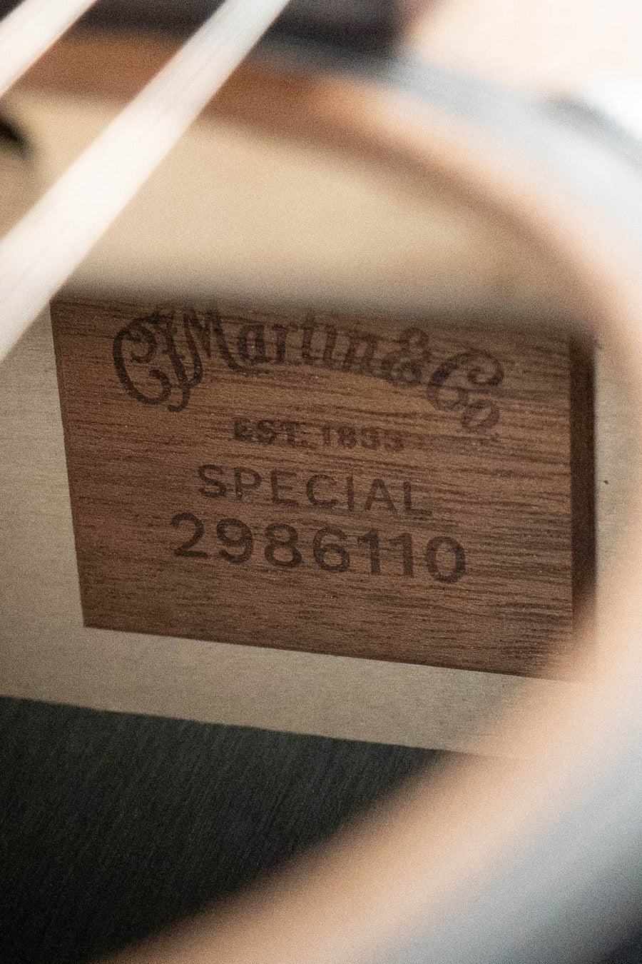 Wooden guitar label inside the soundhole with Martin & Co logo and serial number 2986110. - Martin GP-X2E Sapele/HPL Ziricote Grand Performance Guitar w/Martin Electronics #6110 - Default Title