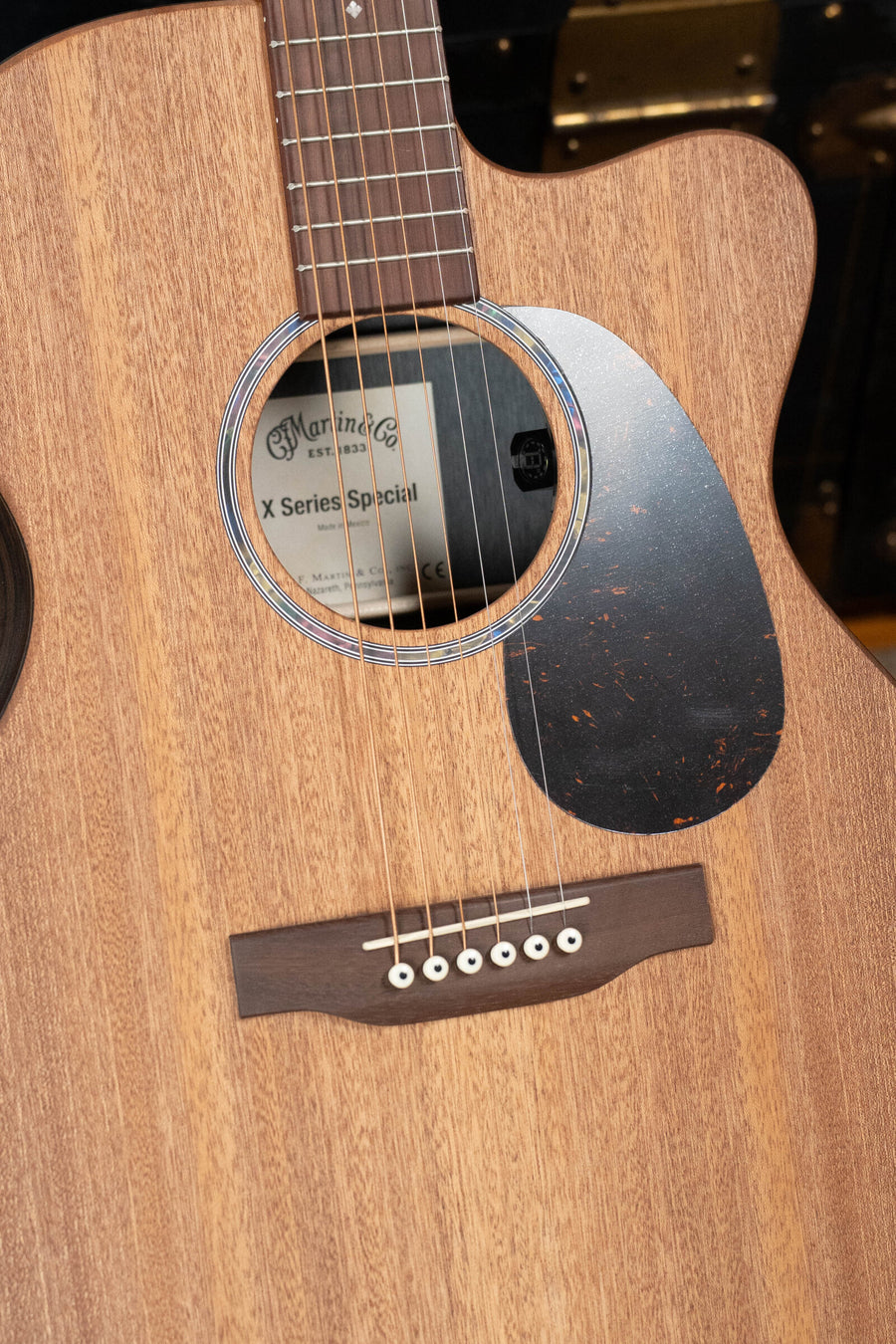 Martin OMC-X2E acoustic guitar with ziricote wood top, cutaway body, black pickguard, and rosewood bridge. - Martin OMC-X2E All HPL Ziricote OM Cutaway Guitar w/Martin Electronics #8900 - Default Title