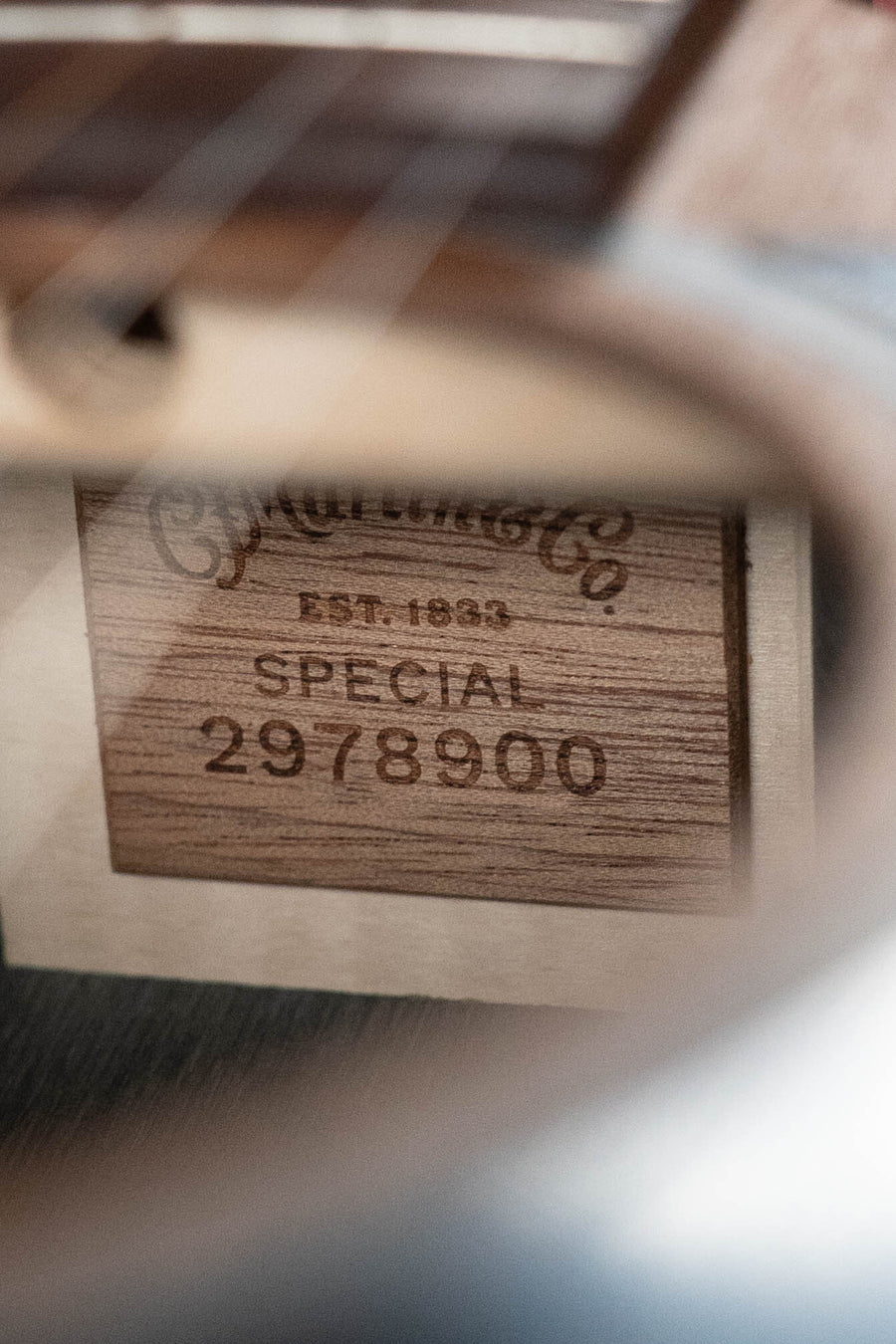 Interior label of Martin OMC-X2E All HPL Ziricote guitar showing model and serial number. - Martin OMC-X2E All HPL Ziricote OM Cutaway Guitar w/Martin Electronics #8900 - Default Title