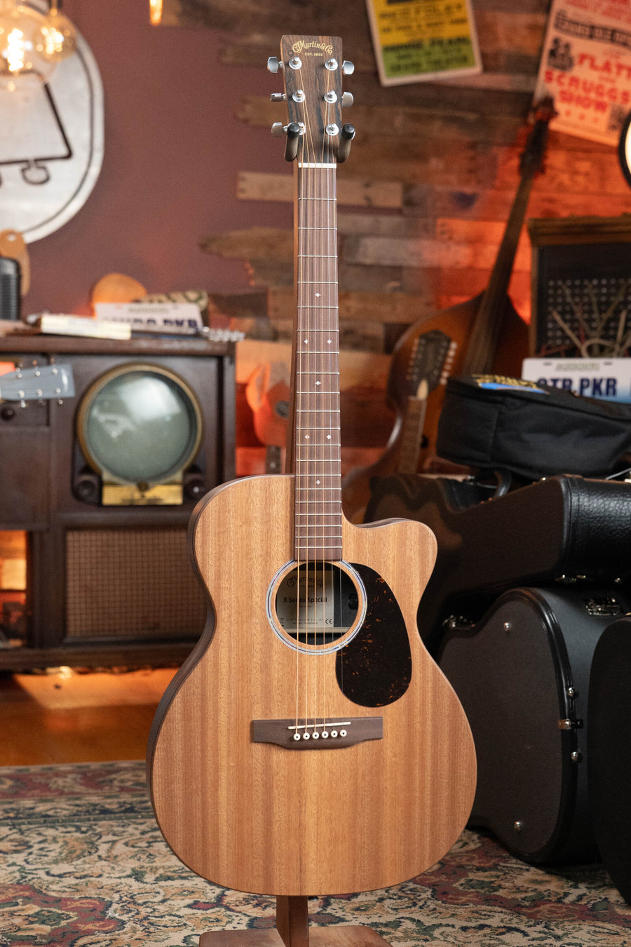 Martin OMC-X2E Ziricote OM guitar with cutaway, HPL body, natural wood finish, and ebony pickguard. - Martin OMC-X2E All HPL Ziricote OM Cutaway Guitar w/Martin Electronics #8900 - Default Title