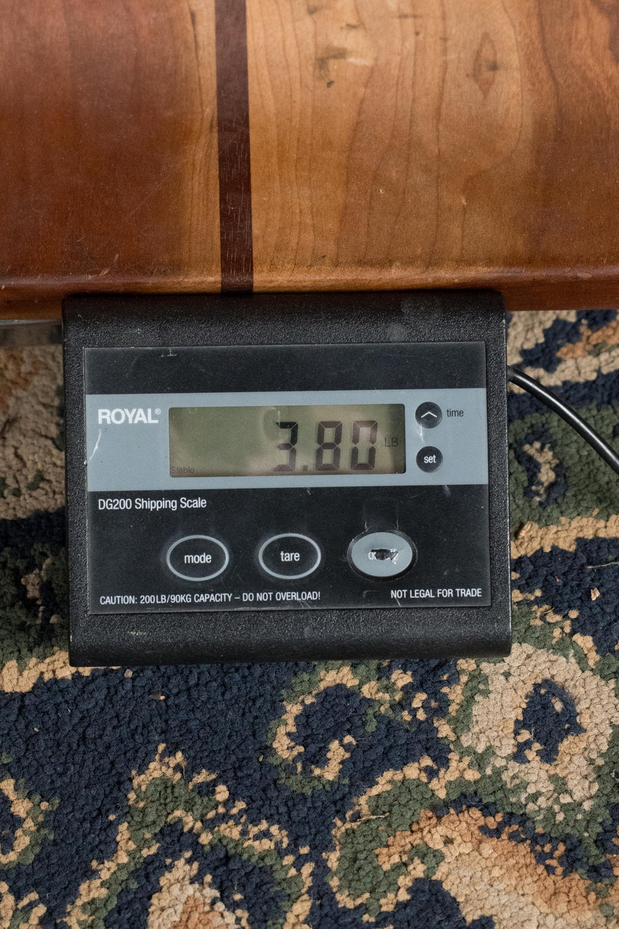 Digital scale displaying a weight of 3.80 pounds on a dark platform with wood surface nearby. - Martin OOO Jr E All Sapele OOO Guitar w/Martin Electronics #4824 - Default Title
