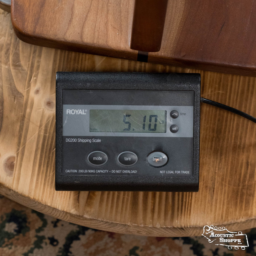 Digital scale displaying 5.10 pounds on a wooden surface with guitar case in background. - Squirrel Hunter Rosewood Dreadnought Sitka Spruce/ East Indian Rosewood- Local Luthier Showcase - Default Title