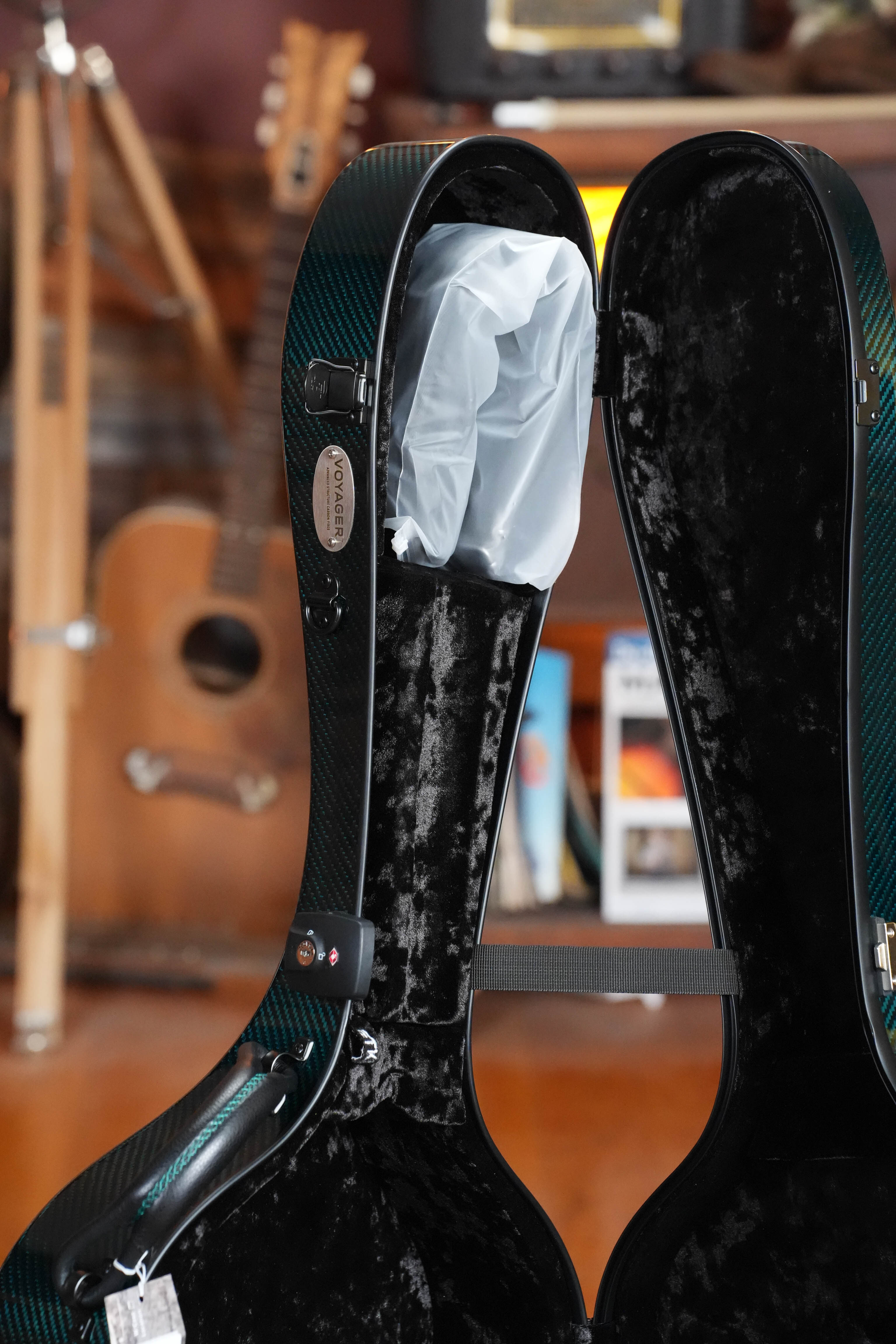 TKL Voyager 14-Fret Traditional OptiX Teal/Black Carbon Fiber Triple O/ Orchestra Model Case