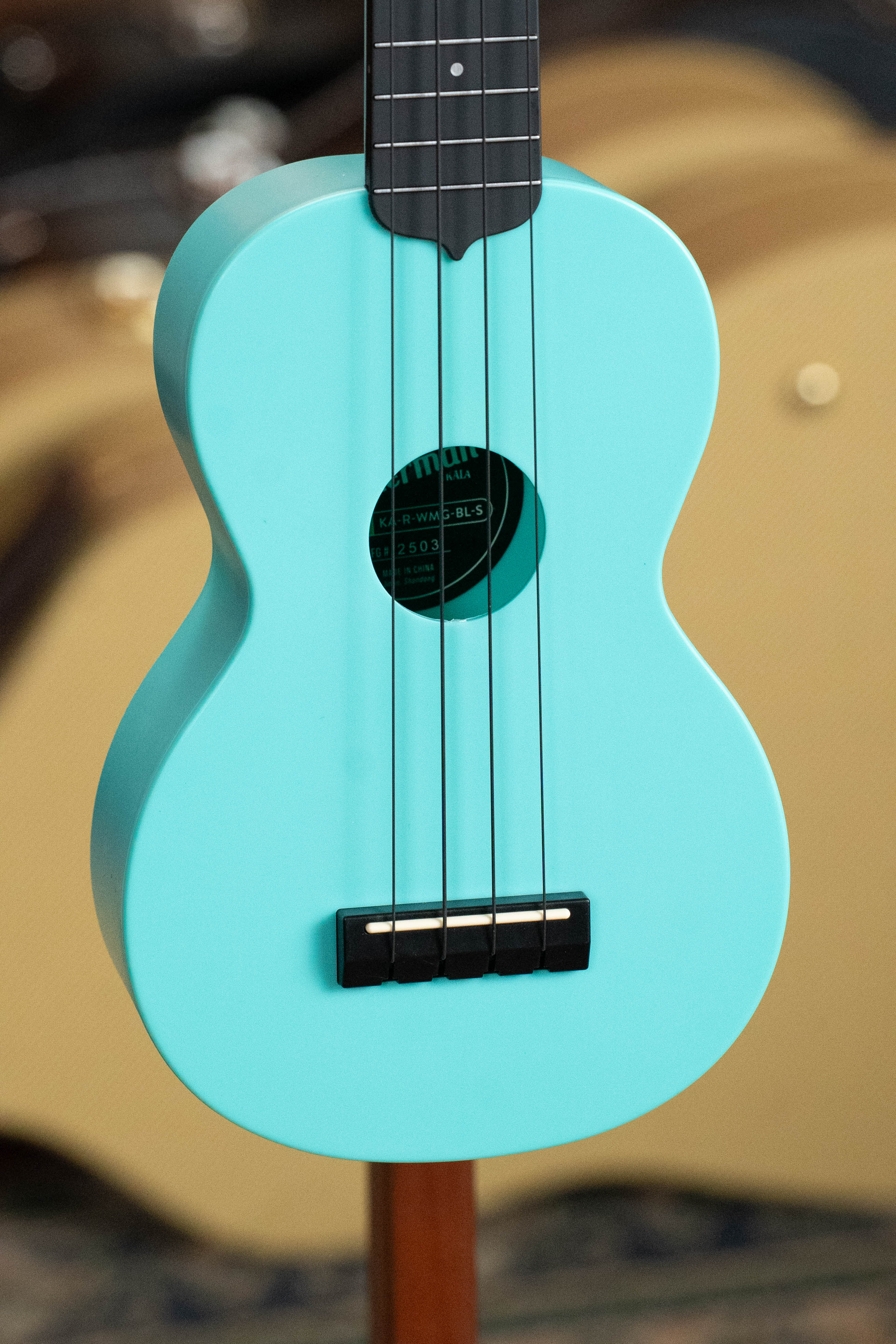 Soprano ukulele in aqua mist blue with black bridge and fretboard, Kala brand logo inside soundhole. - The Waterman Aqua Mist Glow-In-The-Dark Soprano Recycled Ukulele - Kala Brand - Default Title
