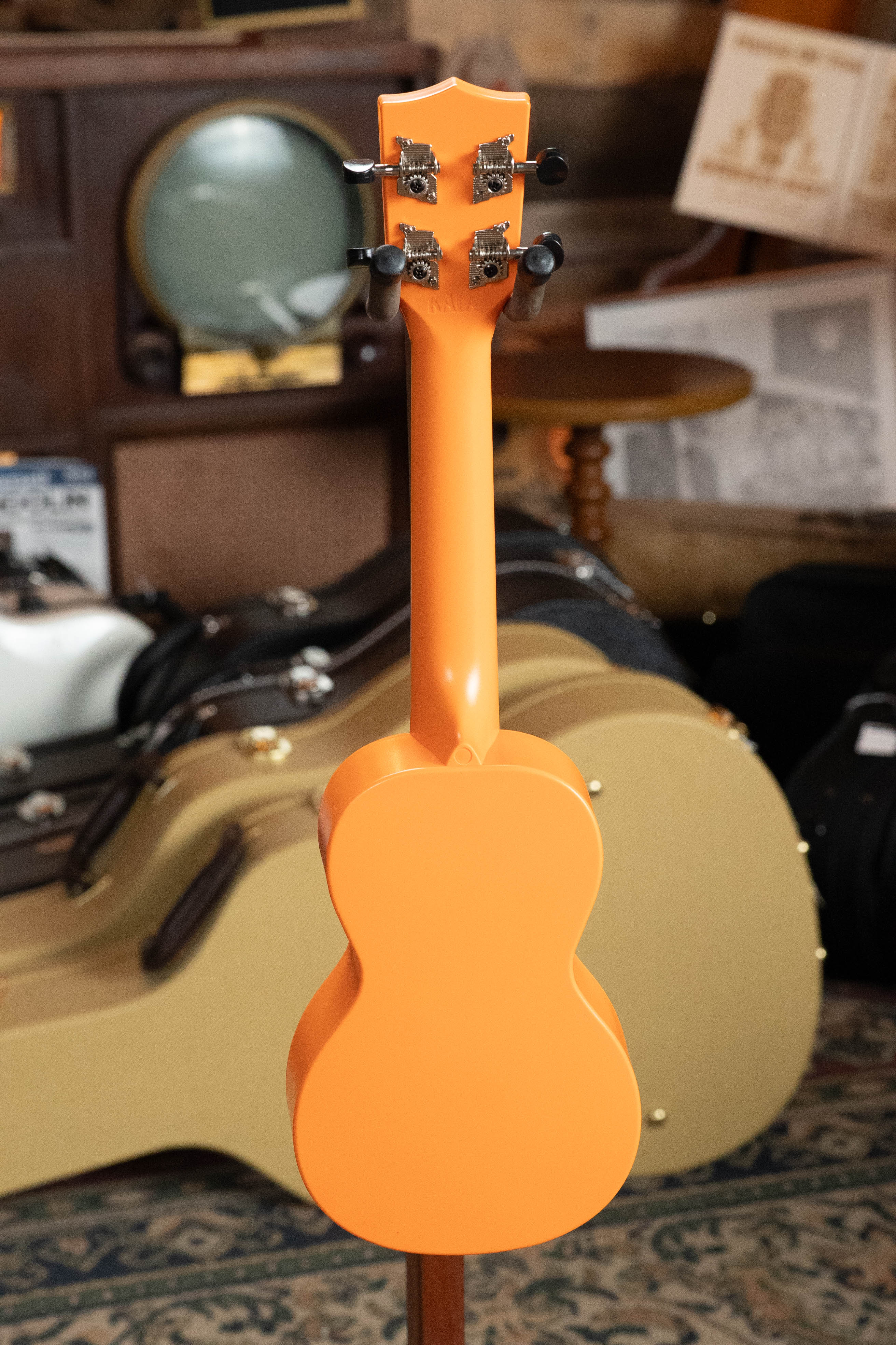 Sunset orange soprano ukulele with chrome tuning pegs and smooth matte finish. - The Waterman Sunset Orange Soprano Recycled Ukulele - Kala Brand - Default Title