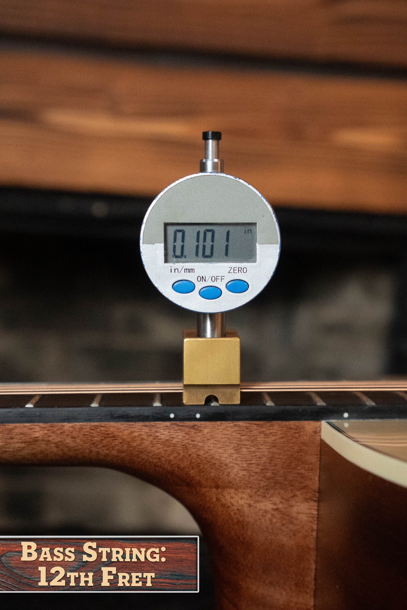 A digital caliper shows 0.101 inches for the string height at the 12th fret on a (Used) 2025 Alvarez RD-26 Spruce/Mahogany Dreadnought Acoustic Guitar #0161. Bass String: 12th Fret appears in the bottom left corner. Brand: Alvarez.
