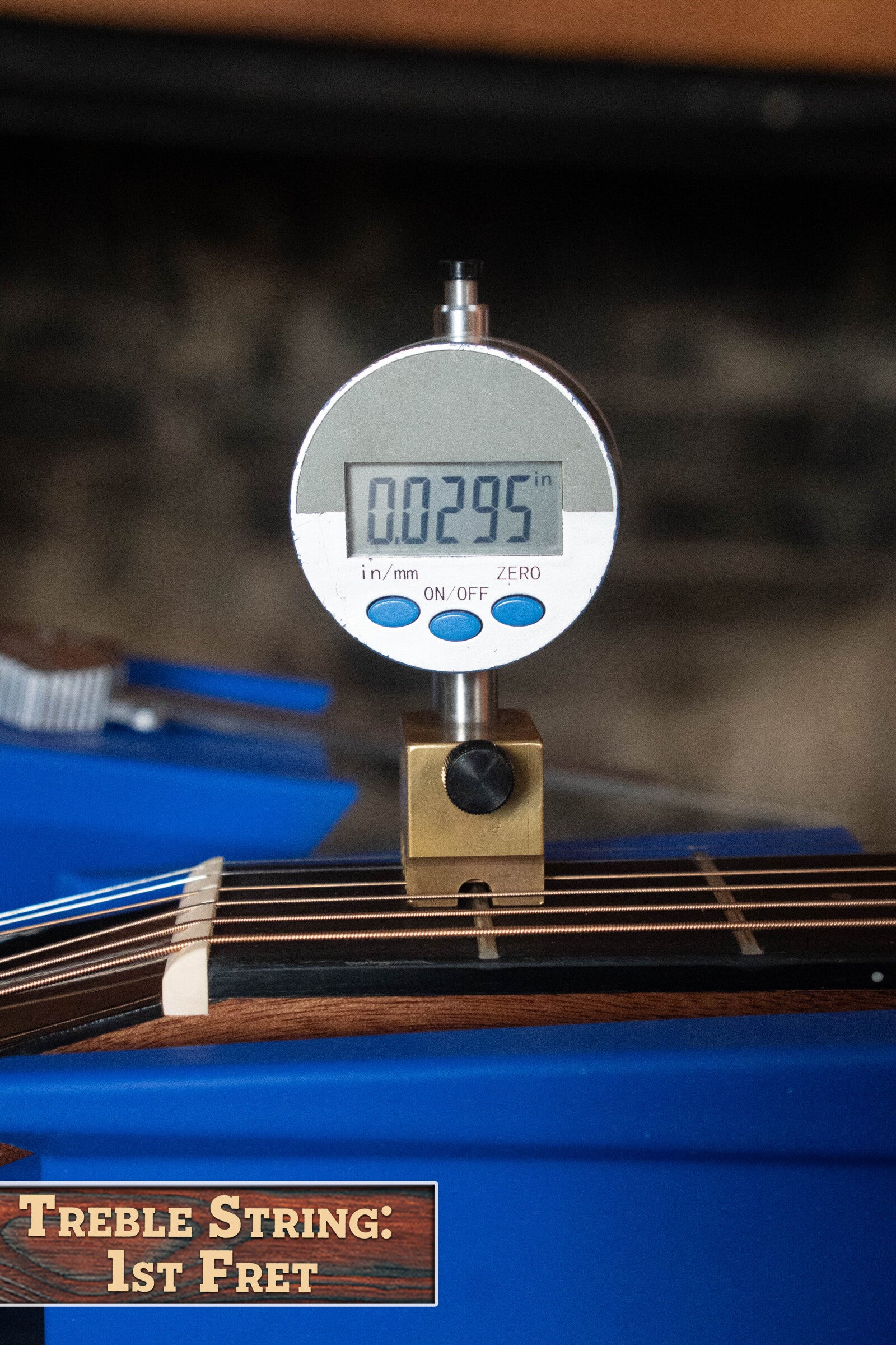 A digital gauge shows a 0.0295-inch string height at the first fret of an Alvarez (Used) 2025 RD-26 Spruce/Mahogany Dreadnought Acoustic Guitar #0161; Treble String: 1st Fret appears in the bottom left corner.