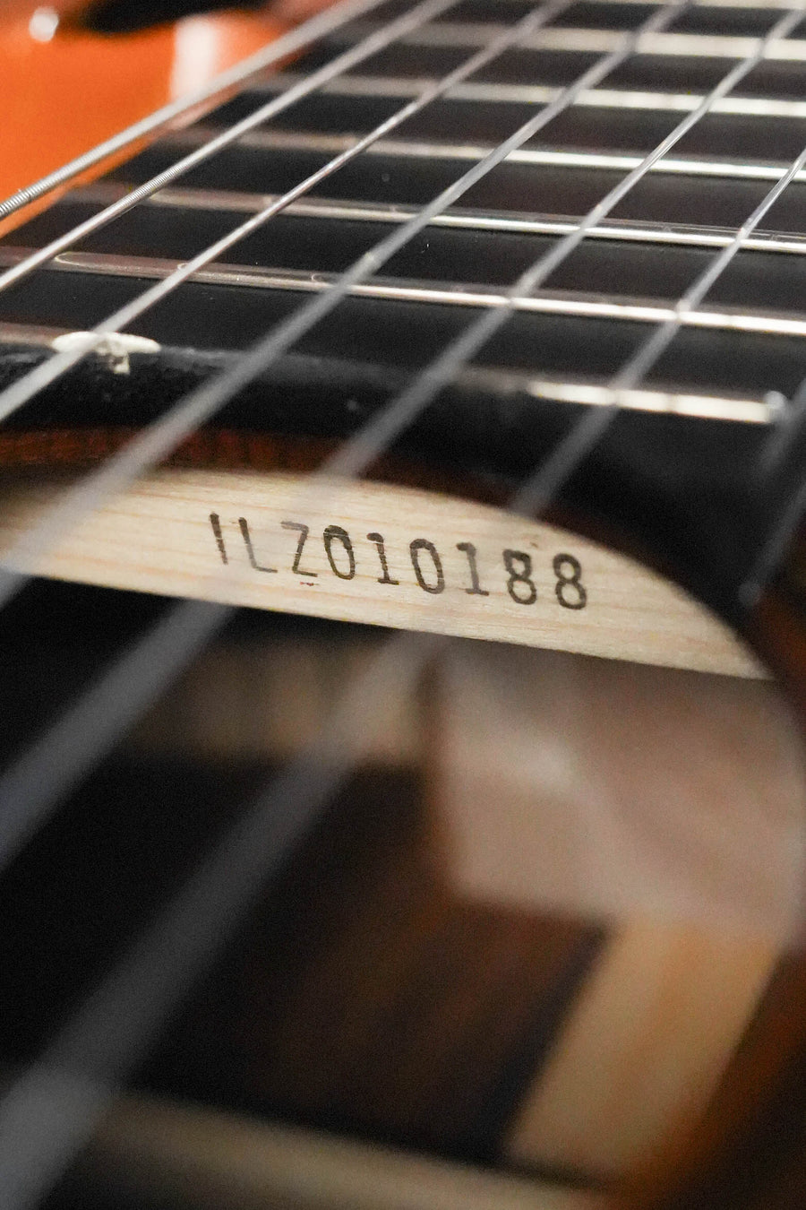 Close-up of the Yamaha CG192C Cedar/Rosewood Classical Acoustic Guitar #0188, highlighting its cedar top, fretboard, and soundhole.