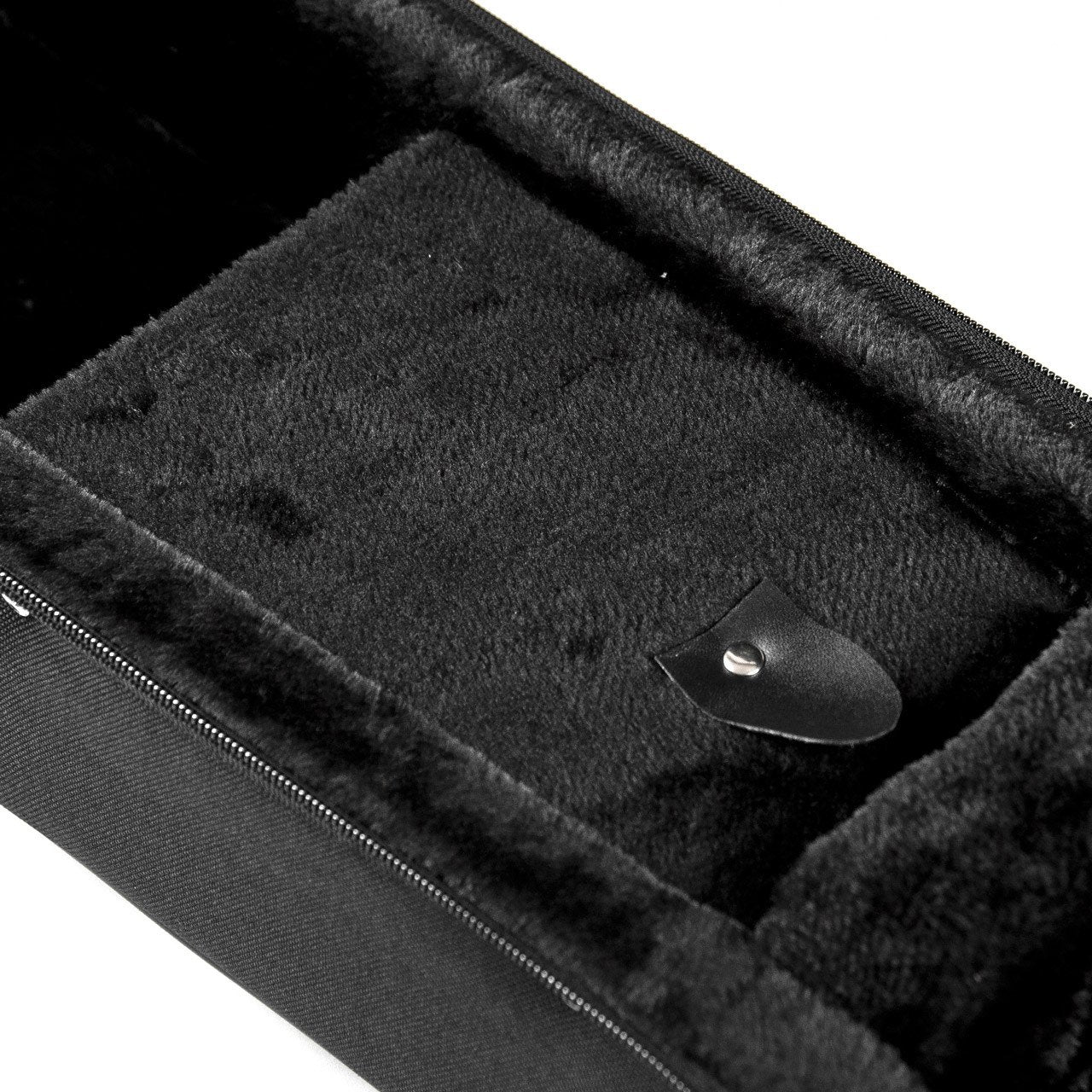 Close-up of the Guardian Hard Foam Case - Soprano Ukulele (CG-010-US) by Guardian, featuring plush lining, a leather pull tab compartment, and high-density foam padding for secure instrument protection.
